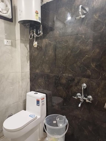 Imagen de la habitación del Hotel The Fragrance. Foto 12