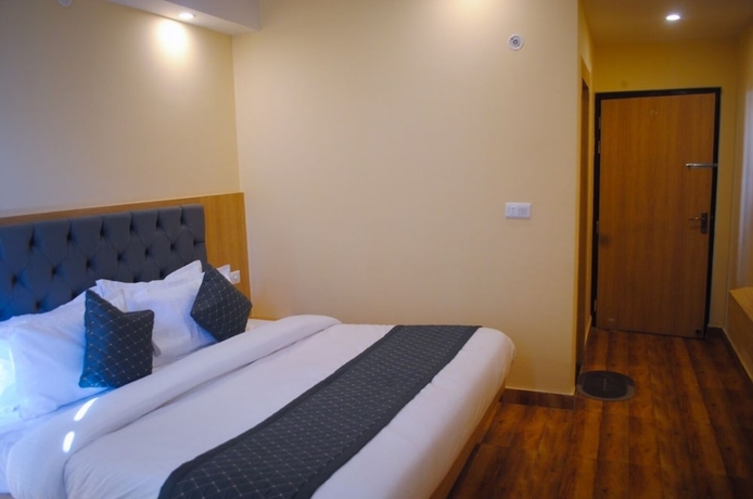 Imagen de la habitación del Hotel The Fragrance. Foto 13