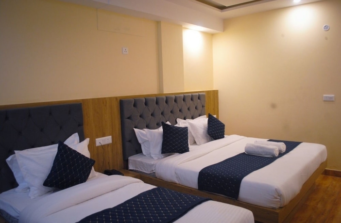 Imagen de la habitación del Hotel The Fragrance. Foto 15