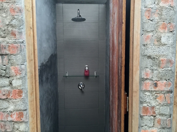 Imagen de la habitación del Hotel The Frame Guesthouse. Foto 11