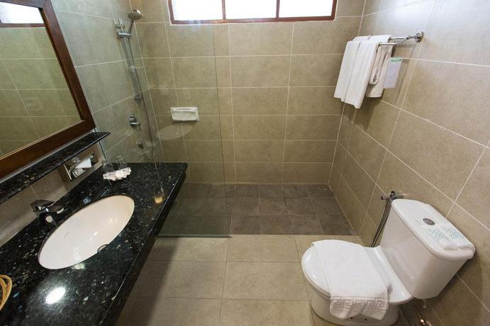 Imagen de la habitación del Hotel The Frangipani Langkawi Resort and Spa. Foto 12