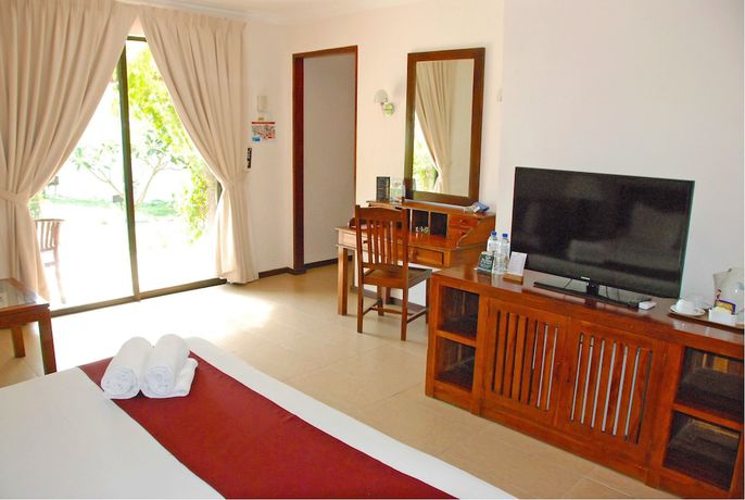 Imagen de la habitación del Hotel The Frangipani Langkawi Resort and Spa. Foto 13