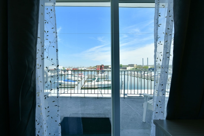 Imagen de la habitación del Hotel The Freeport Inn And Marina. Foto 11