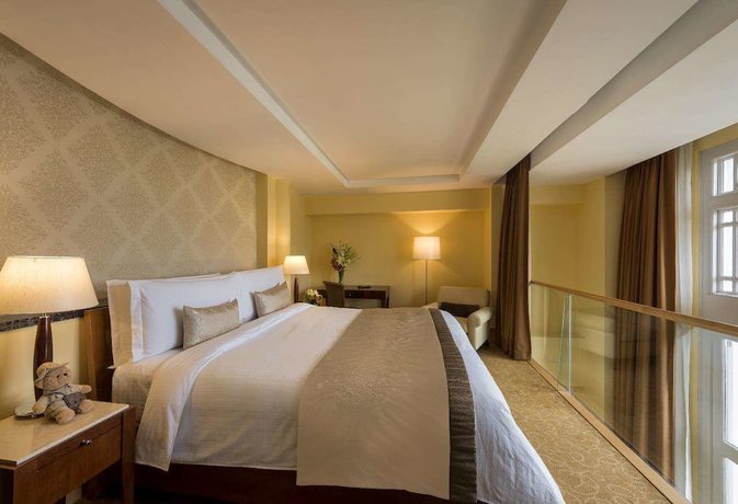 Imagen de la habitación del Hotel The Fullerton Singapore. Foto 18