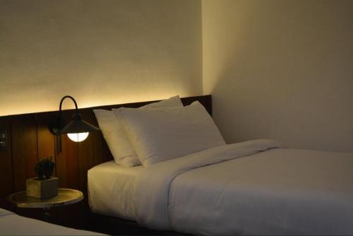 Imagen de la habitación del Hotel The Funny Lion. Foto 7