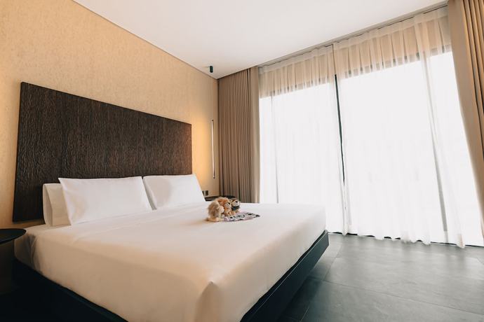 Imagen de la habitación del Hotel The Funny Lion - Puerto Princesa. Foto 1
