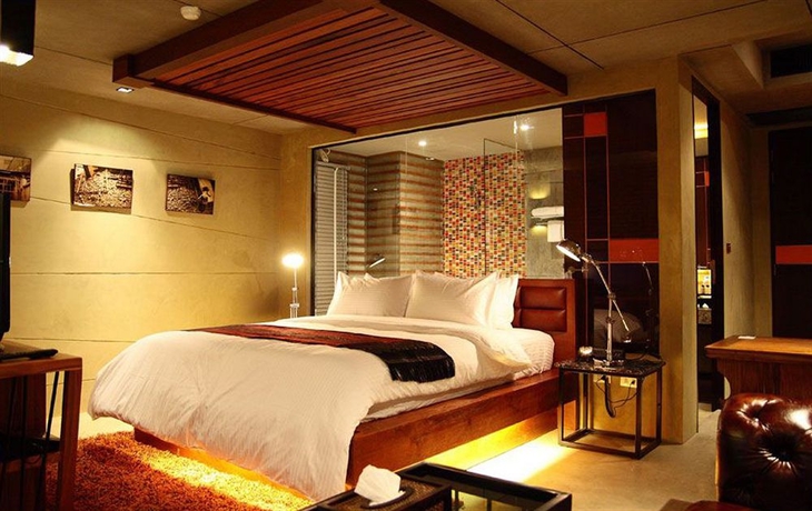 Imagen de la habitación del Hotel The Fusion Suites. Foto 1