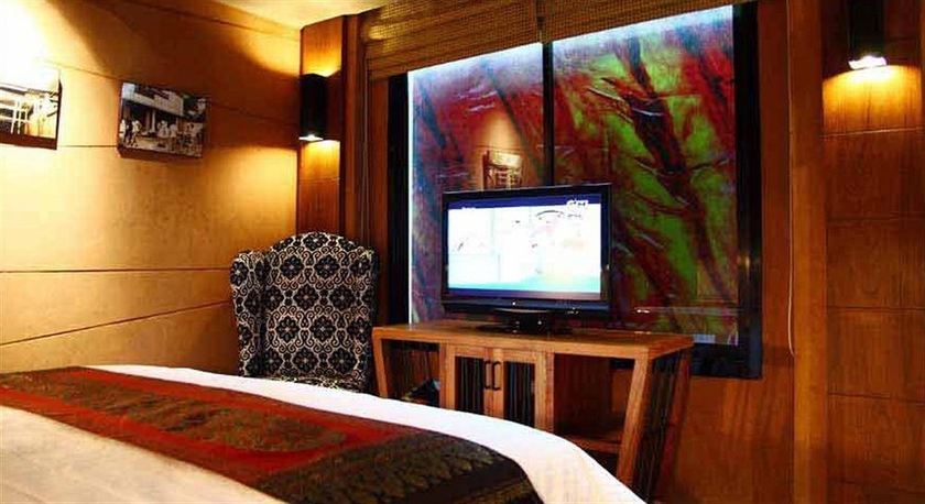 Imagen de la habitación del Hotel The Fusion Suites. Foto 2
