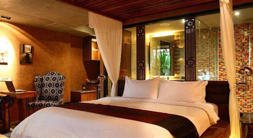Imagen de la habitación del Hotel The Fusion Suites. Foto 3