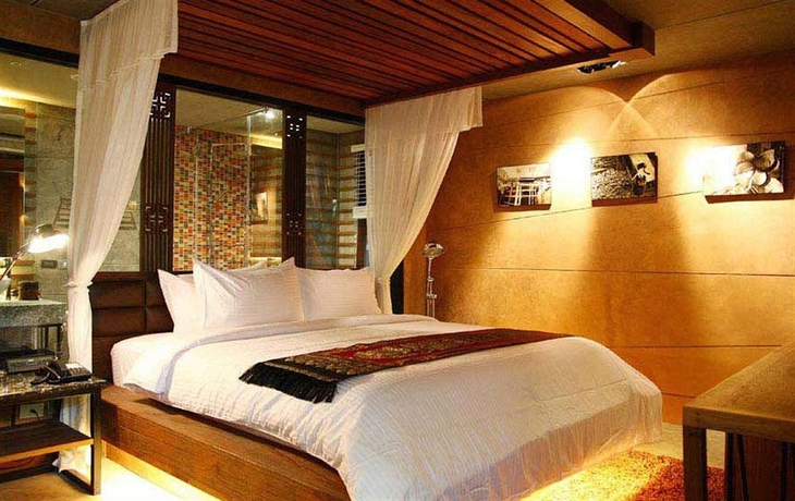 Imagen de la habitación del Hotel The Fusion Suites. Foto 4