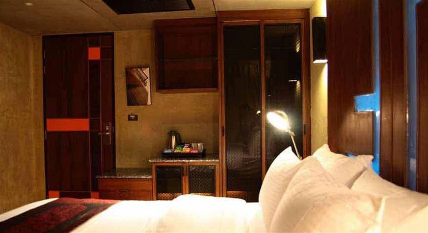 Imagen de la habitación del Hotel The Fusion Suites. Foto 6