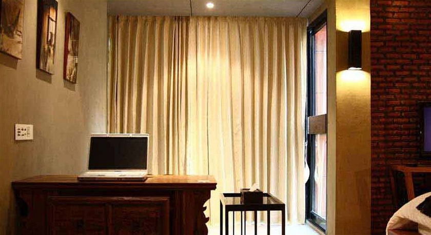 Imagen de la habitación del Hotel The Fusion Suites. Foto 8