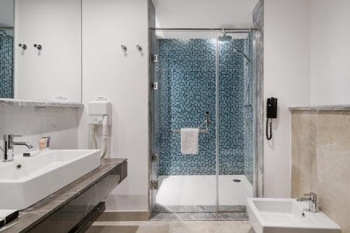 Imagen de la habitación del Hotel The G Einbay. Foto 15