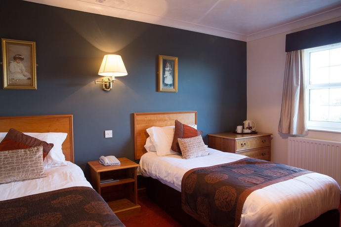 Imagen de la habitación del Hotel The Gables. Foto 7