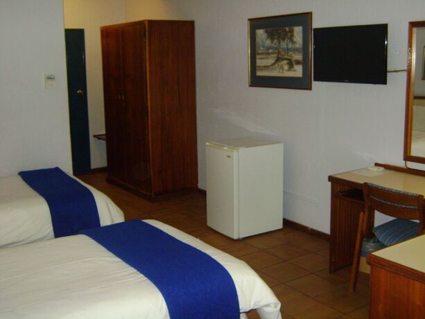 Imagen de la habitación del Hotel The Gaborone. Foto 20