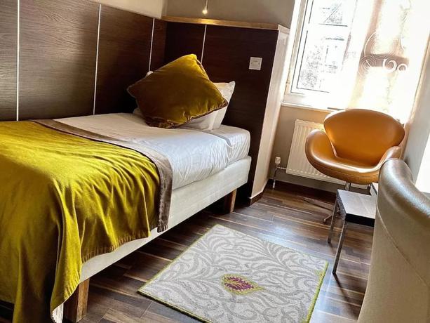 Imagen de la habitación del Hotel The Galaxie. Foto 7