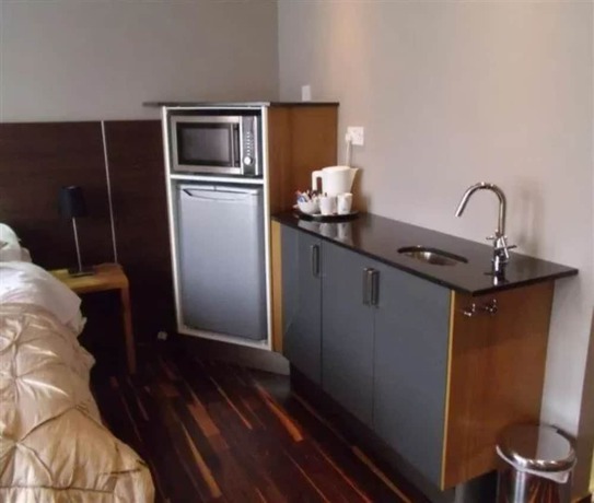 Imagen de la habitación del Hotel The Galaxie. Foto 19