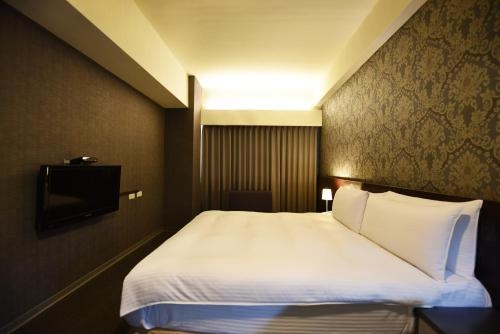 Imagen de la habitación del Hotel The Galerie. Foto 7