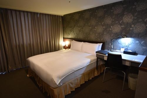 Imagen de la habitación del Hotel The Galerie. Foto 8
