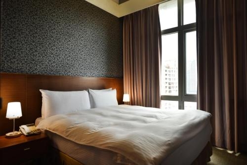 Imagen de la habitación del Hotel The Galerie. Foto 10