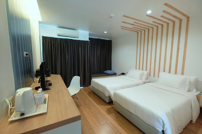 Imagen de la habitación del Hotel The Galla. Foto 6