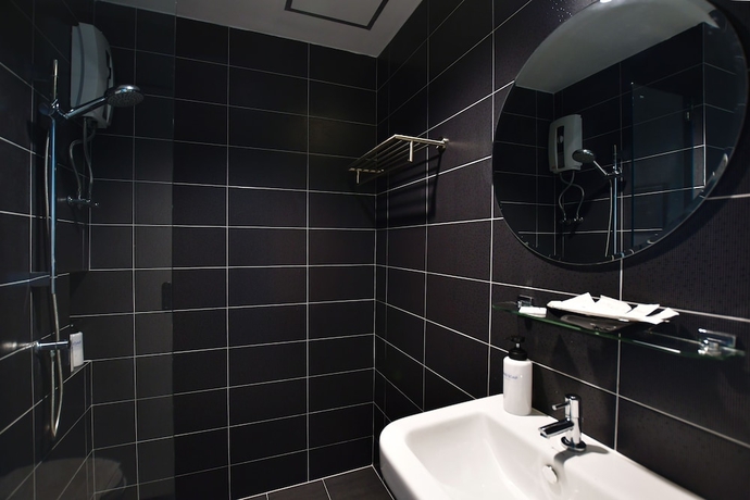 Imagen de la habitación del Hotel The Galla. Foto 10