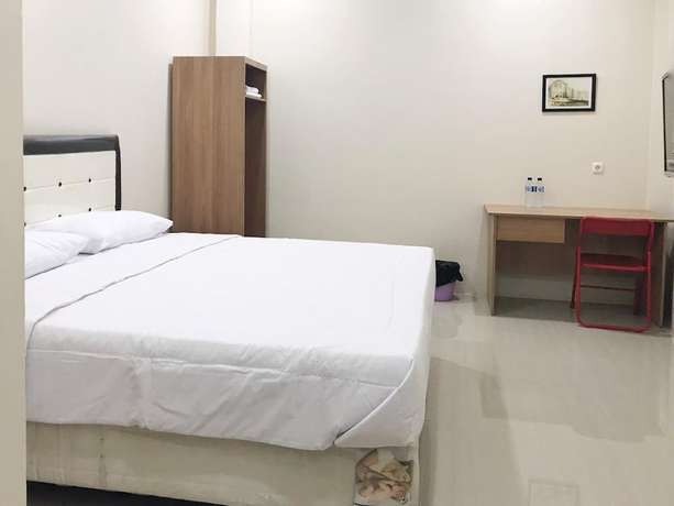 Imagen de la habitación del Hotel The Galton Bau-Bau. Foto 16