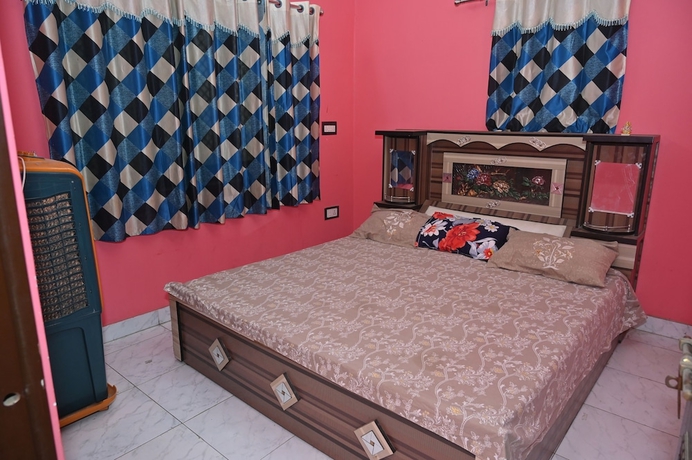 Imagen de la habitación del Hotel The Ganga Guest House. Foto 10