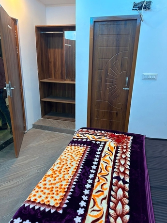 Imagen de la habitación del Hotel The Ganga Residency. Foto 4