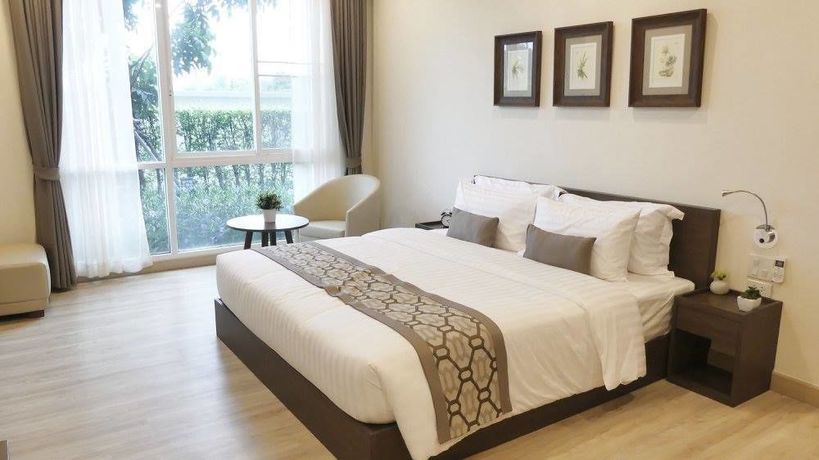 Imagen del bar/restaurante del Hotel The Garden 304. Foto 7