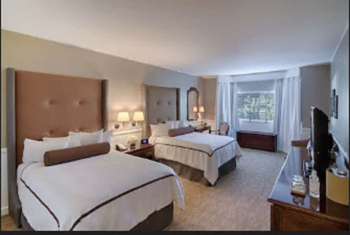 Imagen de la habitación del Hotel The Garden City. Foto 11