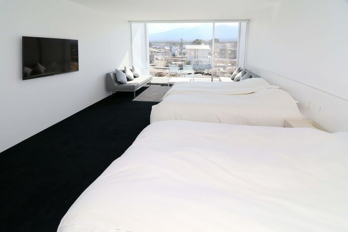 Imagen de la habitación del Hotel The Garden. Foto 15