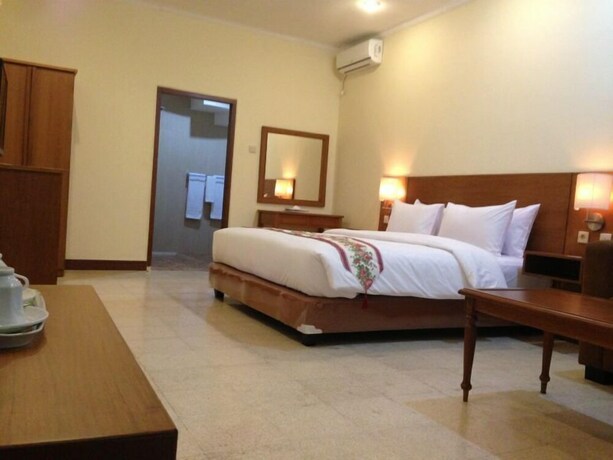 Imagen de la habitación del Hotel The Garden Family Guest House. Foto 14