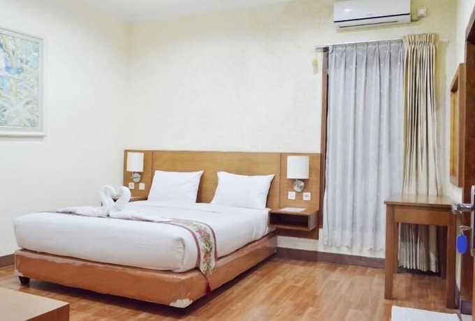 Imagen de la habitación del Hotel The Garden Family Guest House. Foto 16