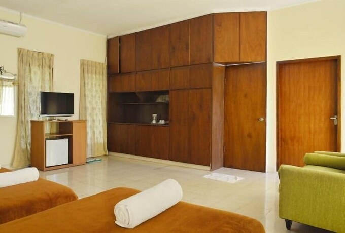 Imagen de la habitación del Hotel The Garden Family Guest House. Foto 22