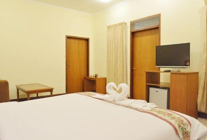 Imagen de la habitación del Hotel The Garden Family Guest House. Foto 28