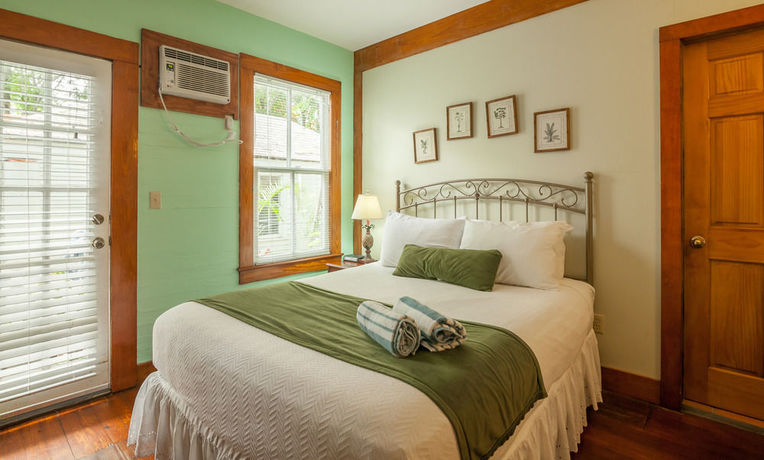 Imagen de la habitación del Hotel The Garden House. Foto 9