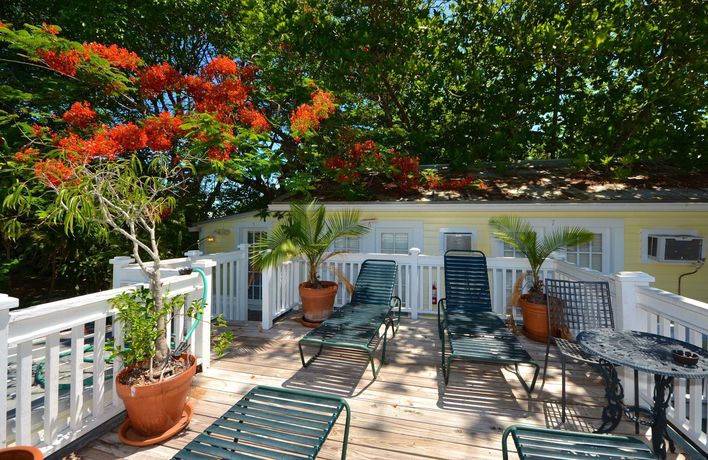 Imagen de la habitación del Hotel The Garden House. Foto 11