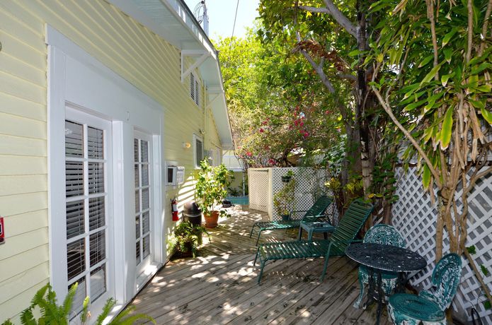 Imagen de la habitación del Hotel The Garden House. Foto 12