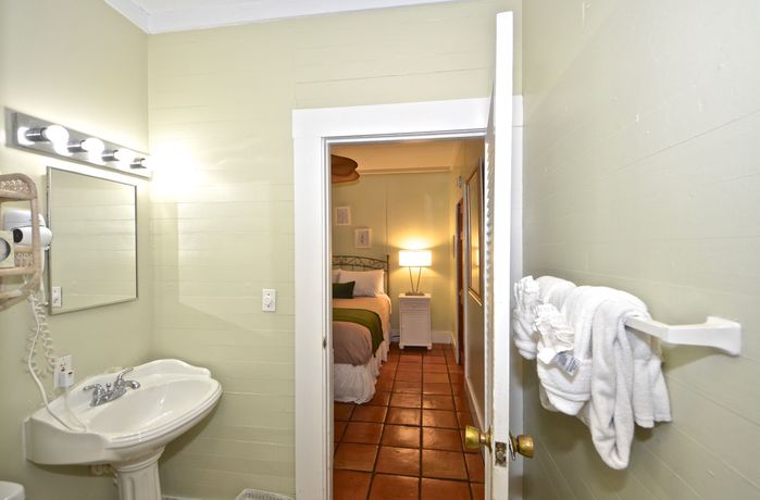 Imagen de la habitación del Hotel The Garden House. Foto 13