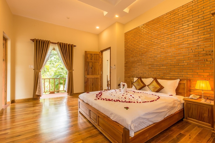 Imagen de la habitación del Hotel The Garden House Phu Quoc Resort. Foto 3