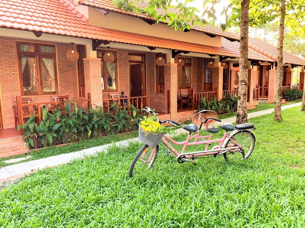 Imagen de la habitación del Hotel The Garden House Phu Quoc Resort. Foto 8