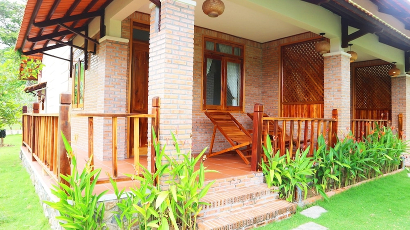 Imagen de la habitación del Hotel The Garden House Phu Quoc Resort. Foto 11