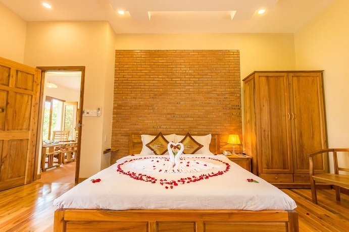 Imagen de la habitación del Hotel The Garden House Phu Quoc Resort. Foto 12