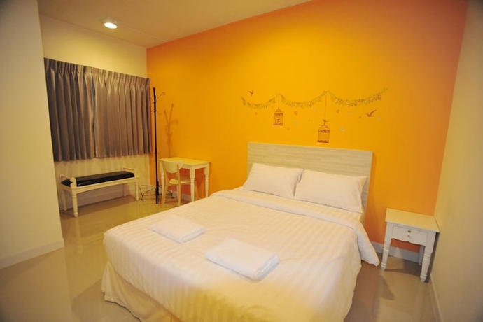 Imagen de la habitación del Hotel The Garden Living. Foto 4