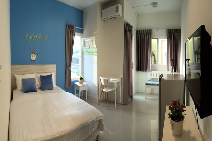 Imagen de la habitación del Hotel The Garden Living. Foto 5