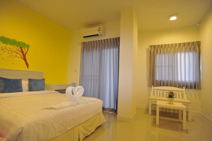 Imagen de la habitación del Hotel The Garden Living. Foto 8