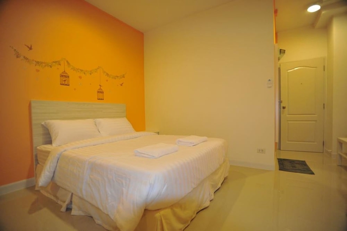 Imagen de la habitación del Hotel The Garden Living. Foto 9