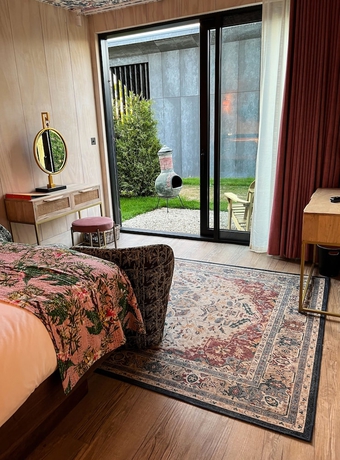 Imagen de la habitación del Hotel The Garden Rooms. Foto 16