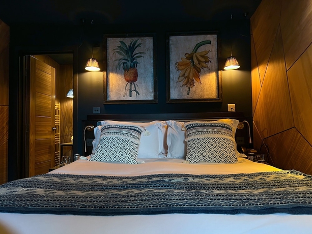 Imagen de la habitación del Hotel The Garden Rooms. Foto 17